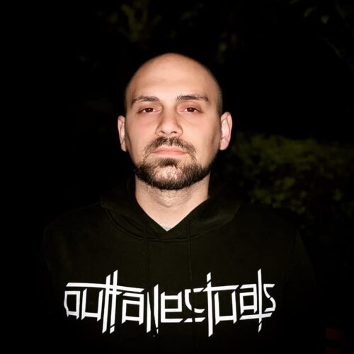 Straight shot of Aryan Ashoori wearing an Outtallectuals hoodie